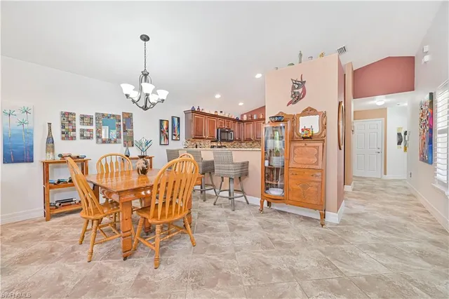 a view of a dining room with furniture