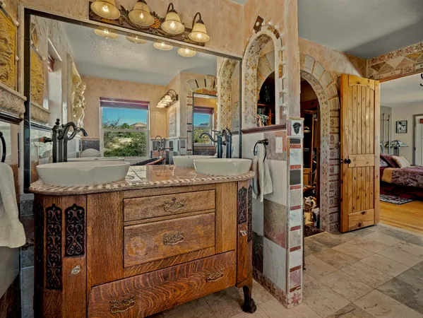 a view of living room kitchen and entryway