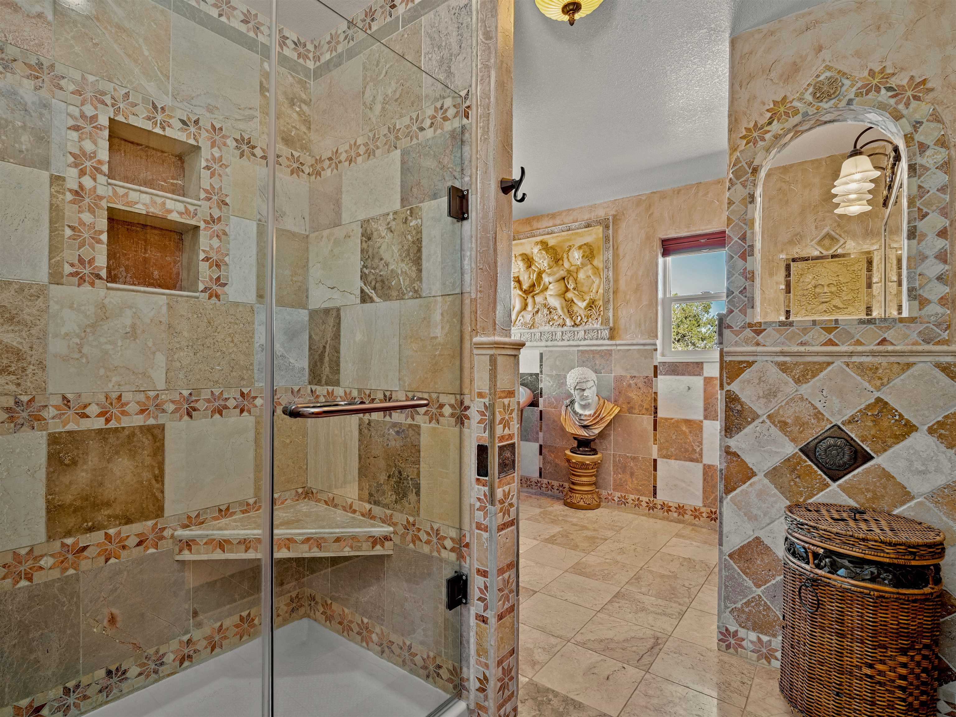 945 Prince Court Fruita, CO 81521 - Photo 17 of 38 a bathroom with a granite countertop shower