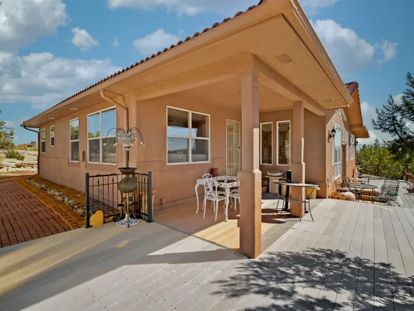 a view of balcony with furniture and outdoor space