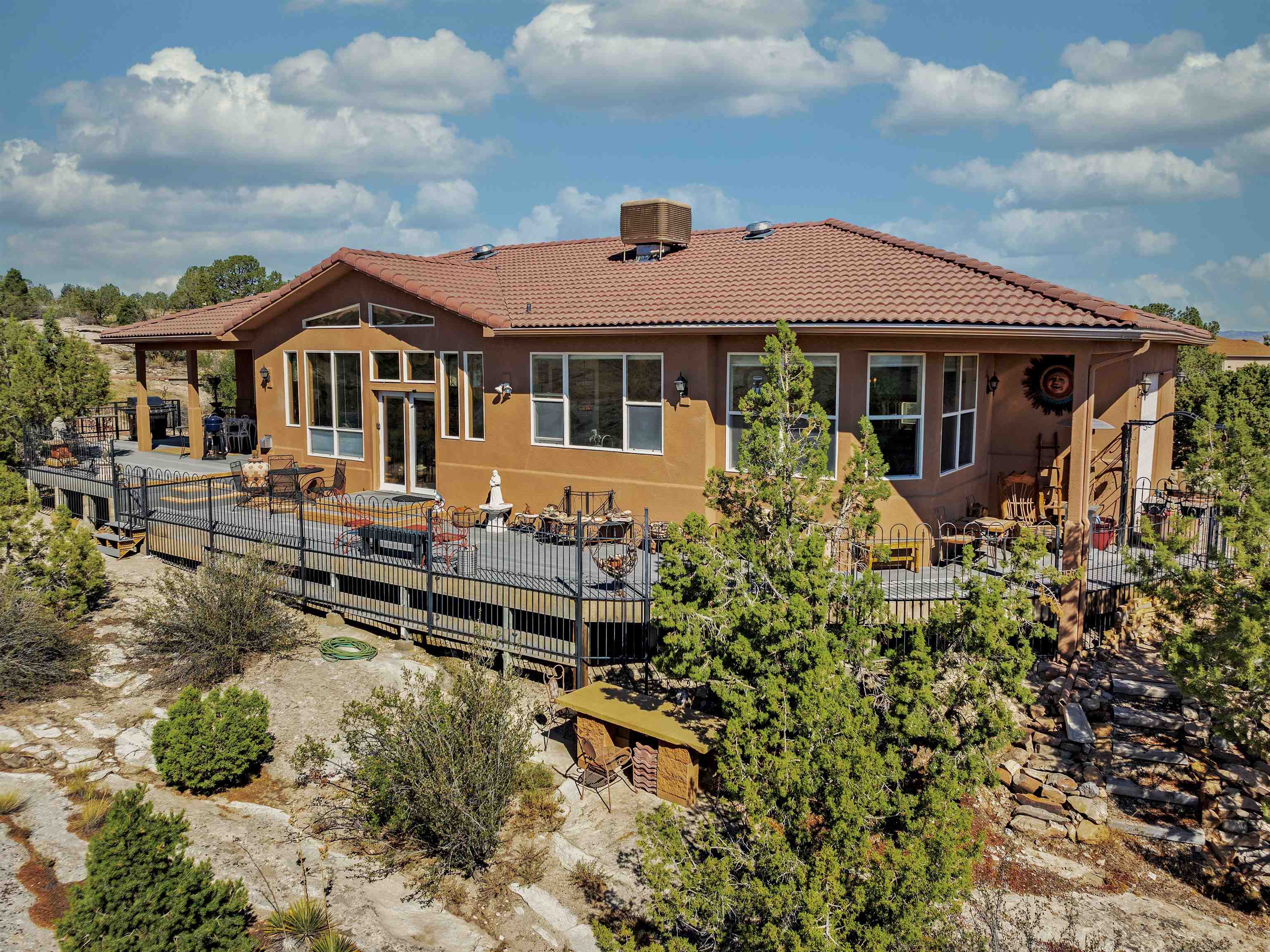 945 Prince Court Fruita, CO 81521 - Photo 3 of 38 a front view of a house with a yard
