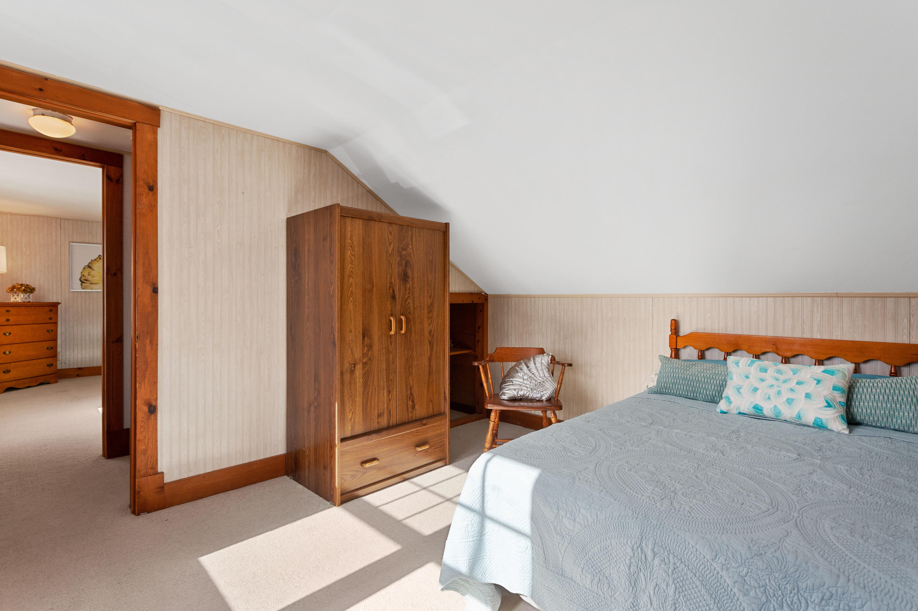 69 George Street Barnstable, MA 02630 - Photo 23 of 32 a bedroom with a bed and a mirror