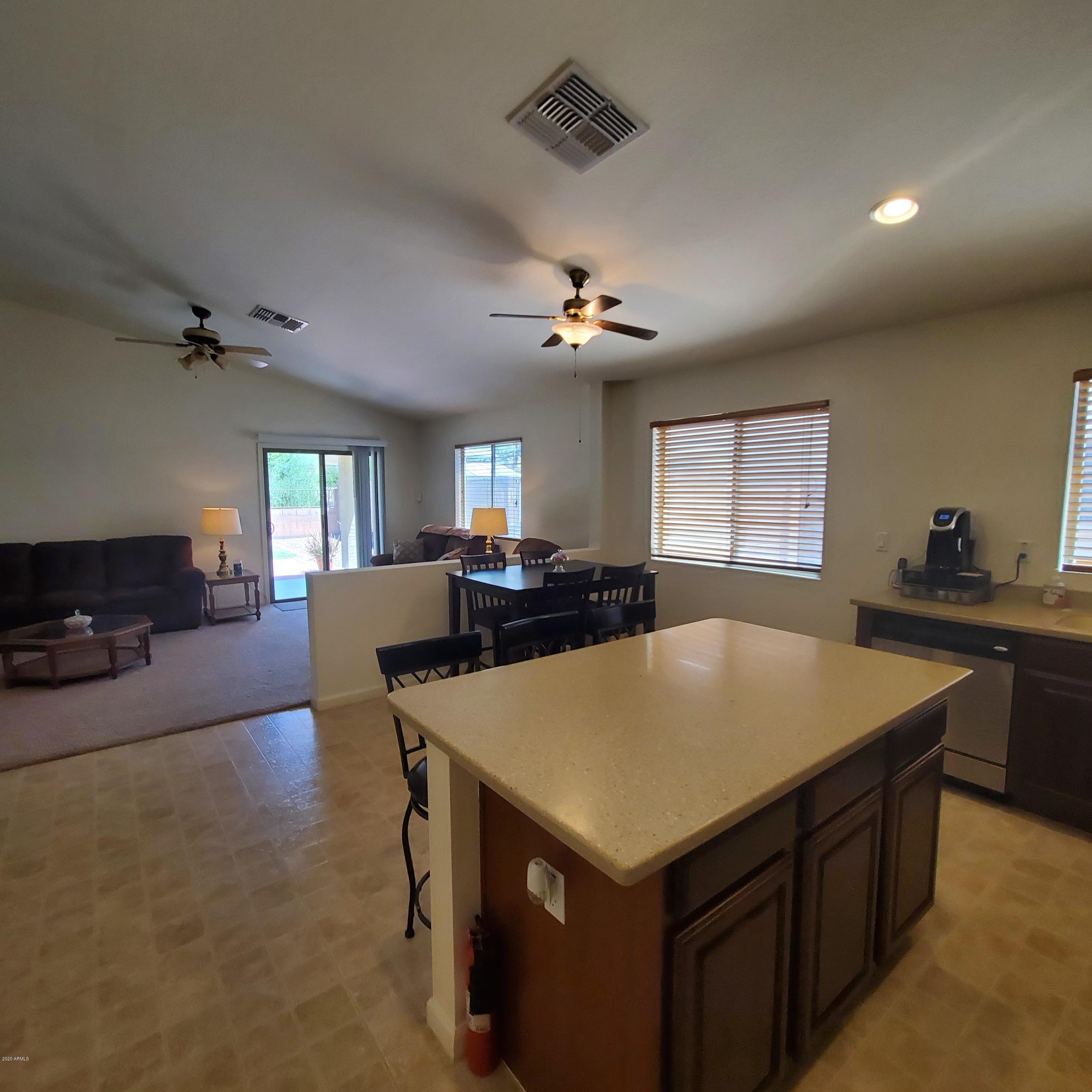 23740 West Pecan Road Buckeye, AZ 85326 - Photo 15 of 42 KITCHEN TO FAMILY ROOM