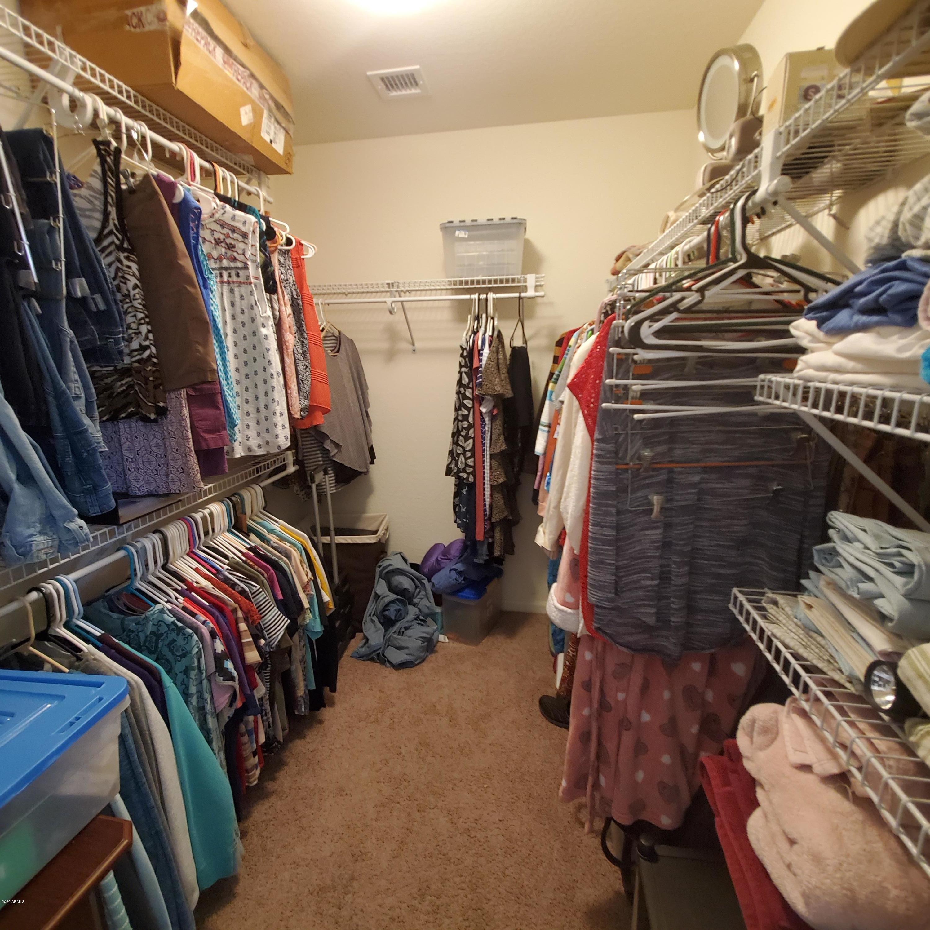 23740 West Pecan Road Buckeye, AZ 85326 - Photo 22 of 42 MASTER BEDROOM WALK-IN CLOSET