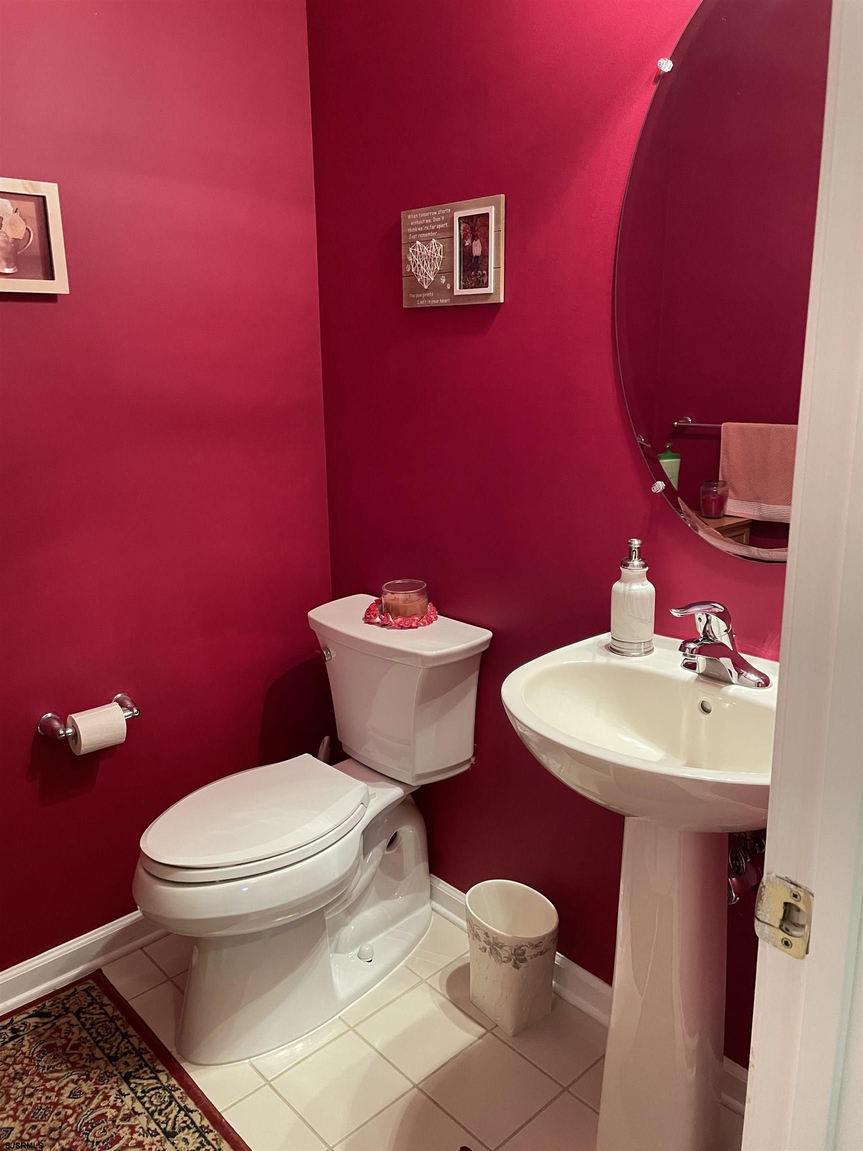 68 Ables Run Drive Absecon, NJ 08201 - Photo 11 of 28 a bathroom with a sink toilet and a mirror