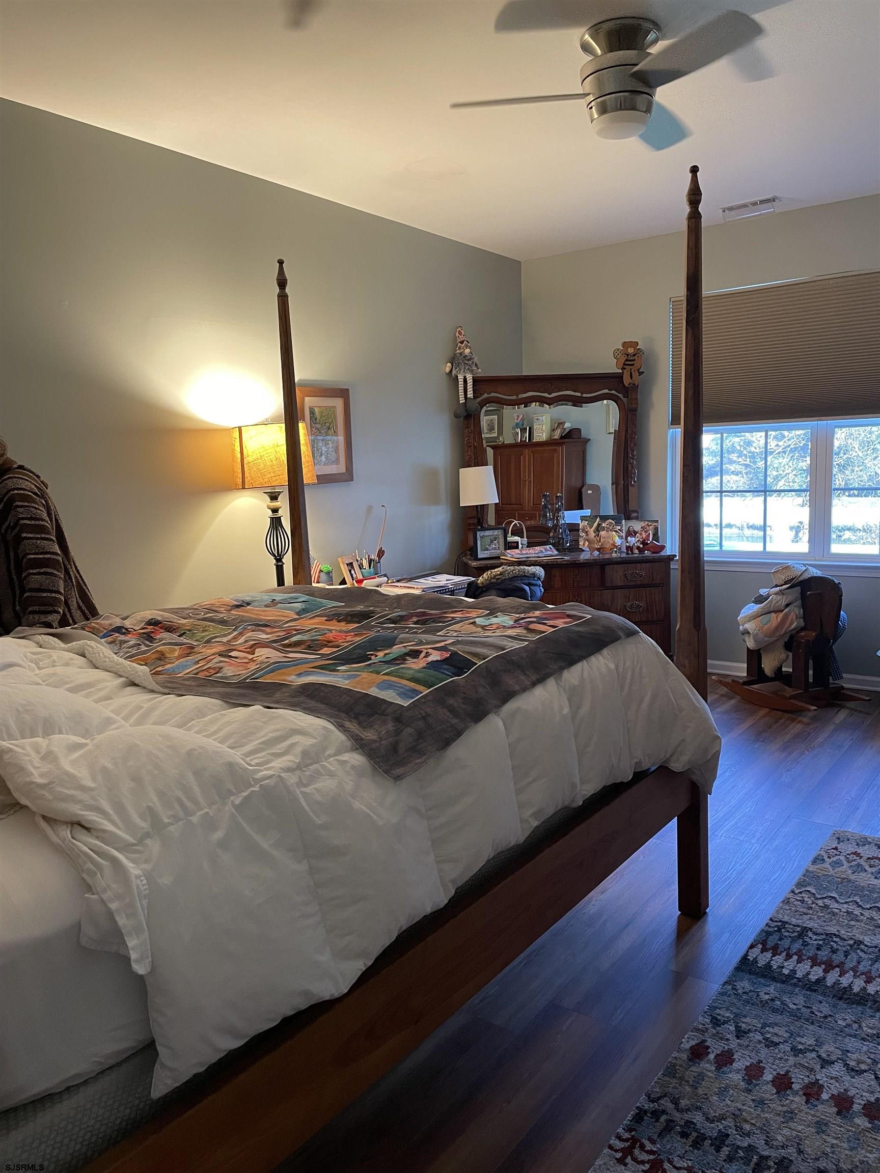 68 Ables Run Drive Absecon, NJ 08201 - Photo 12 of 28 a bedroom with a bed and window