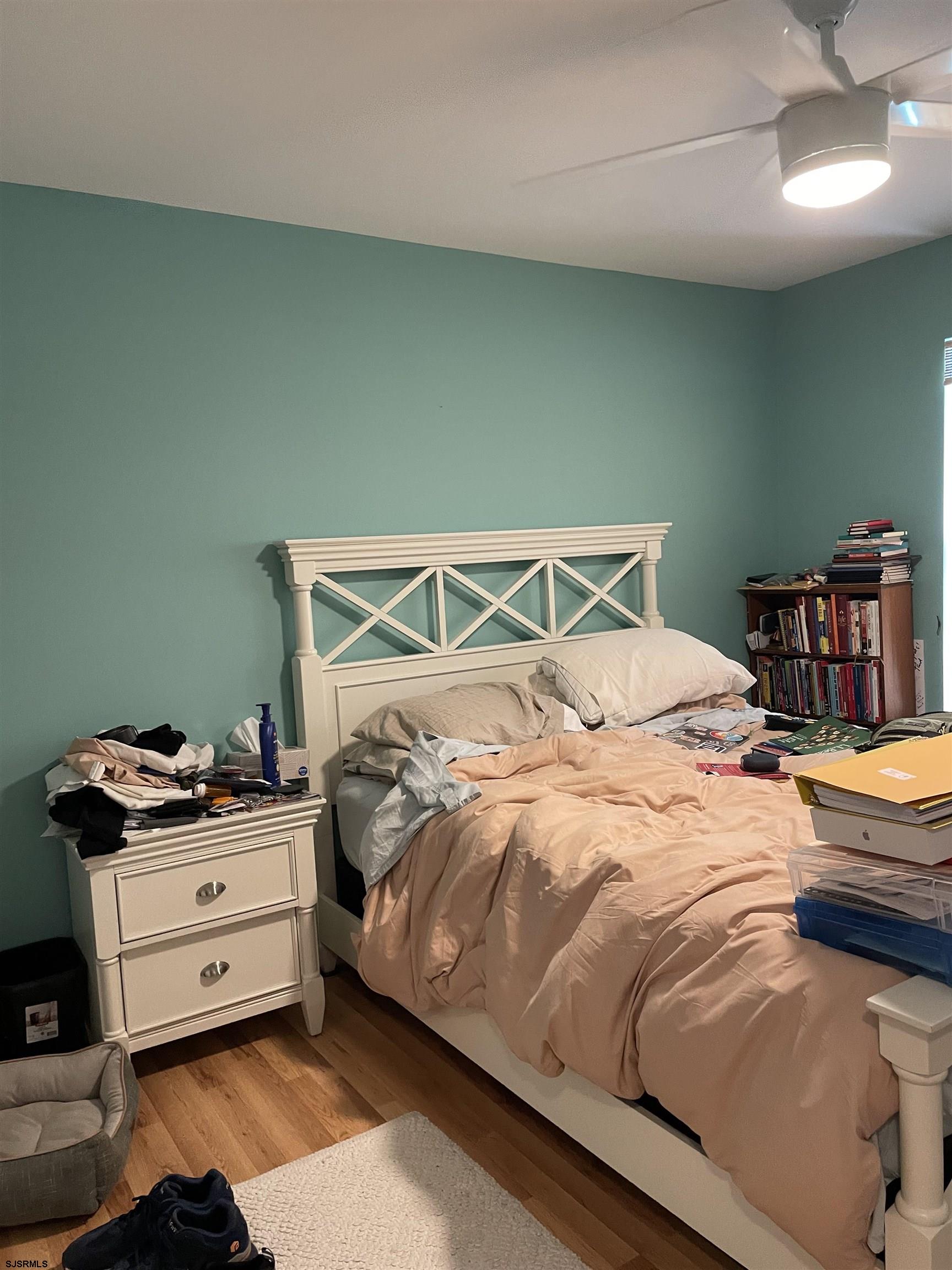 68 Ables Run Drive Absecon, NJ 08201 - Photo 19 of 28 a bedroom with a bed and a table in it