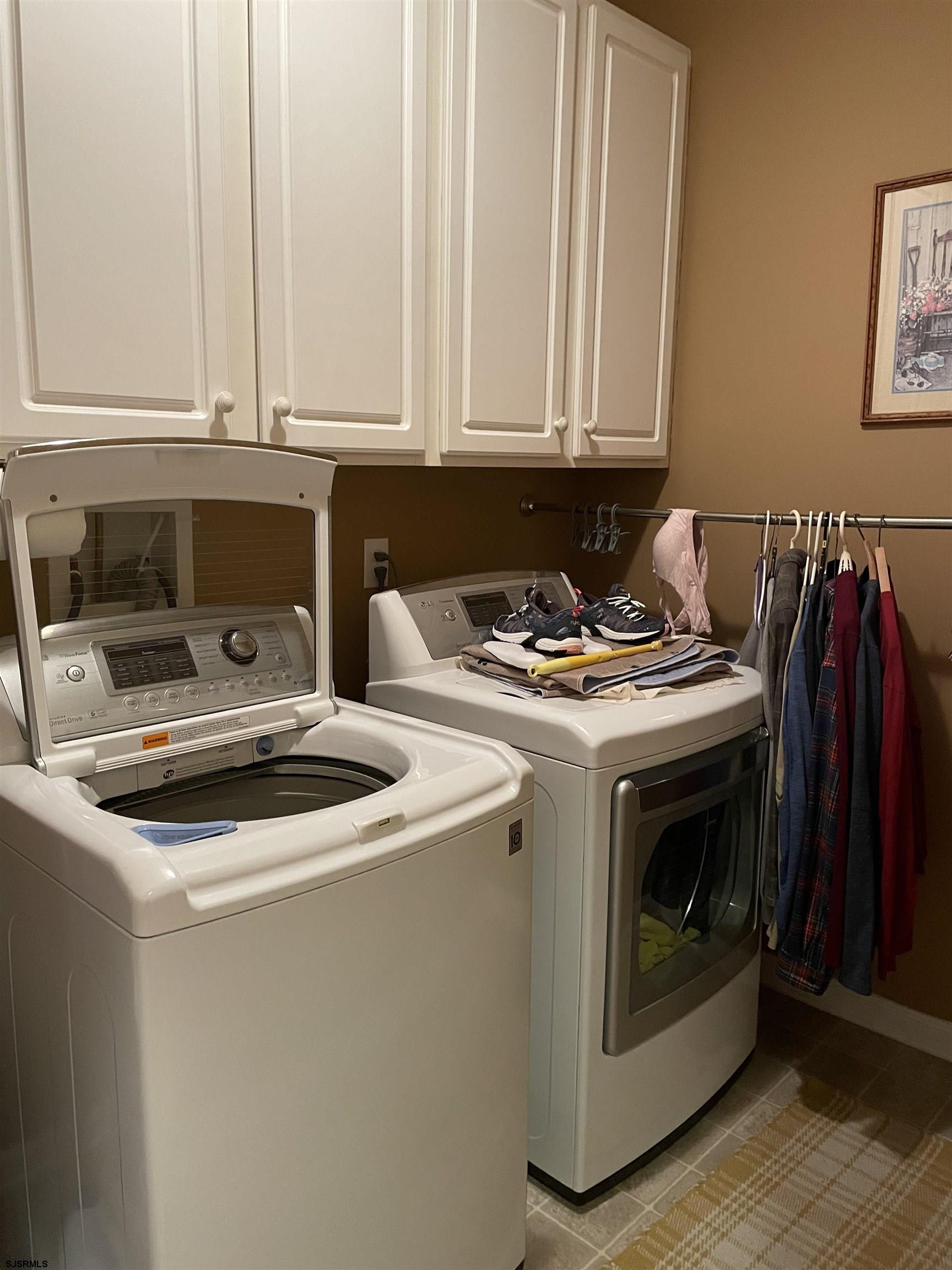 68 Ables Run Drive Absecon, NJ 08201 - Photo 23 of 28 a utility room with dryer and washer