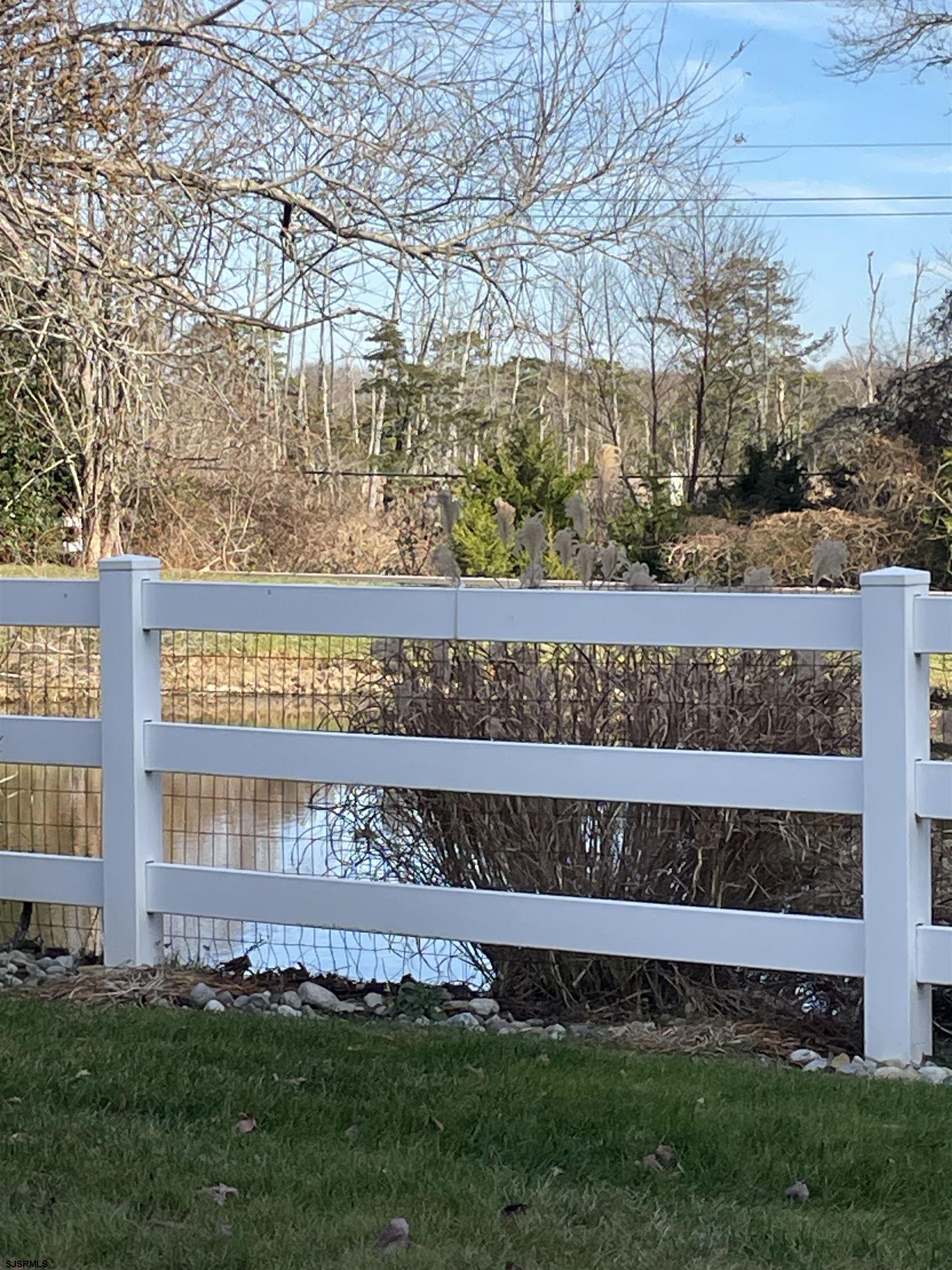 68 Ables Run Drive Absecon, NJ 08201 - Photo 24 of 28 a view of a house with a yard and sitting area