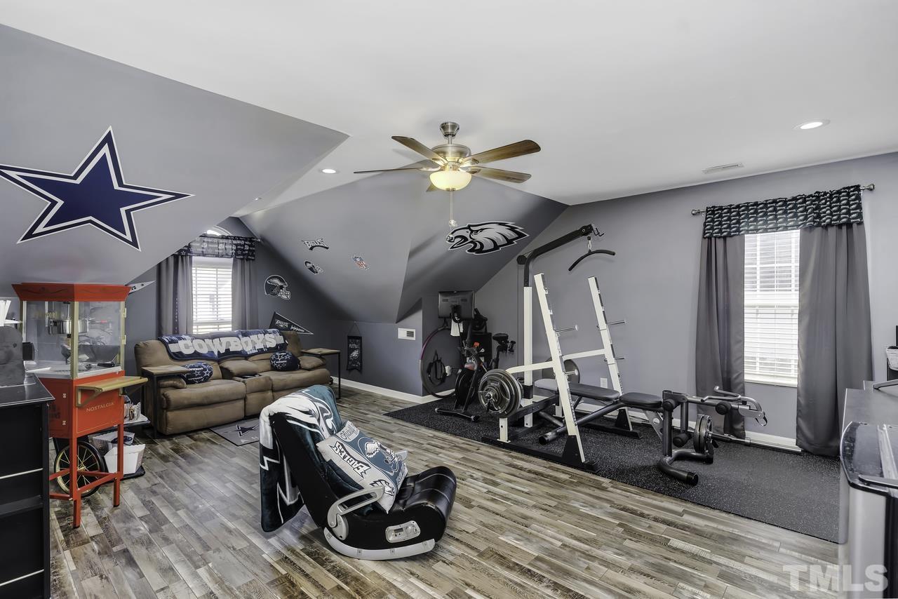 4704 Jelynn Street Raleigh, NC 27616 - Photo 23 of 30 a view of a room with gym equipment