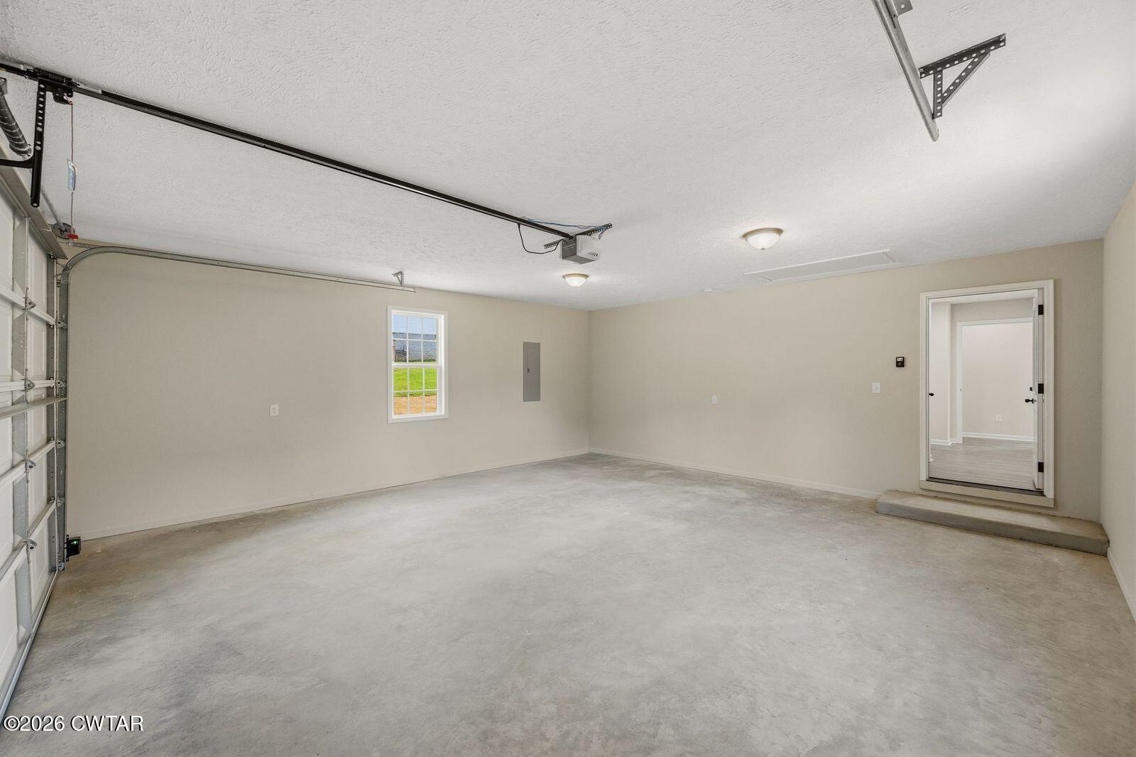 435 Old Huntingdon Road Lexington, TN 38351 - Photo 15 of 26 a view of an empty room with a window