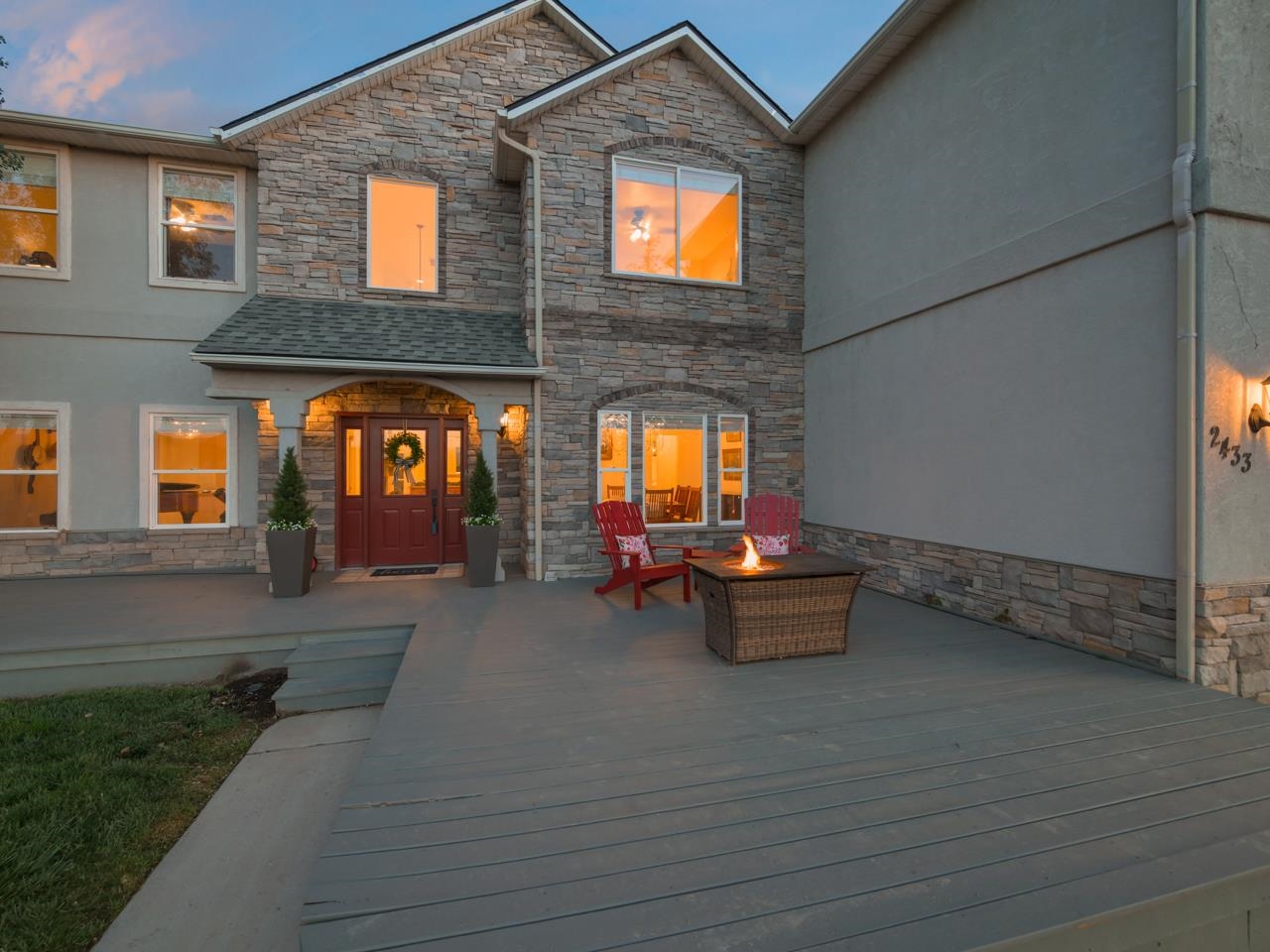 2433 H Road Grand Junction, CO 81505 - Photo 2 of 42 a view of a brick house with outdoor space and a window