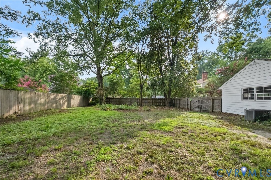 1136 Overbrook Road Petersburg, VA 23805 - Photo 48 of 51 Expansive backyard with a perimeter privacy fence