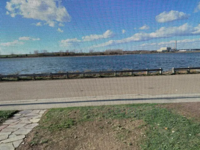 wooden floor in a hall with an entryway
