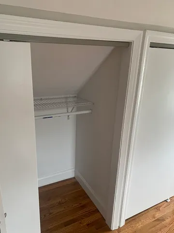 a view of entryway with wooden floor