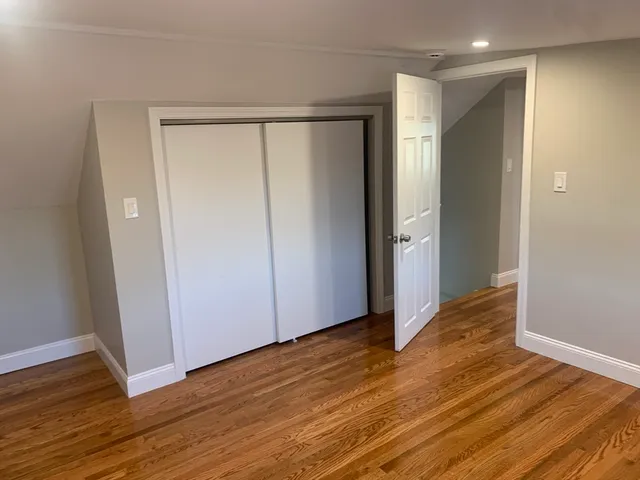 a view of an empty room and window