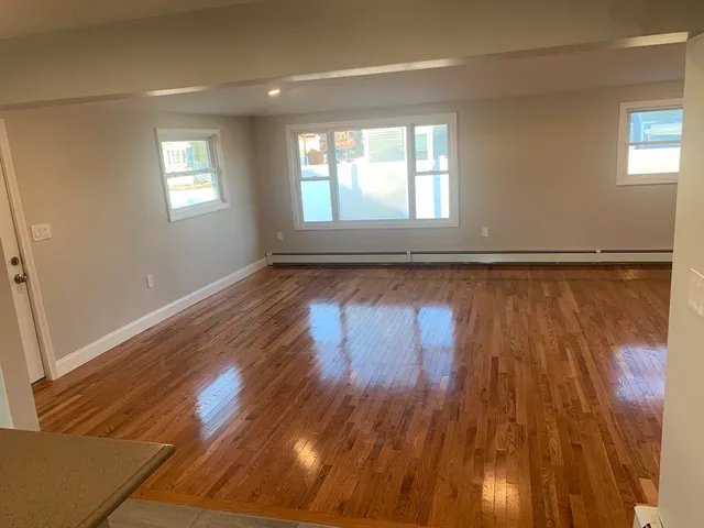 a view of an empty room and window