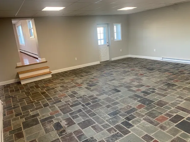 an empty room with windows