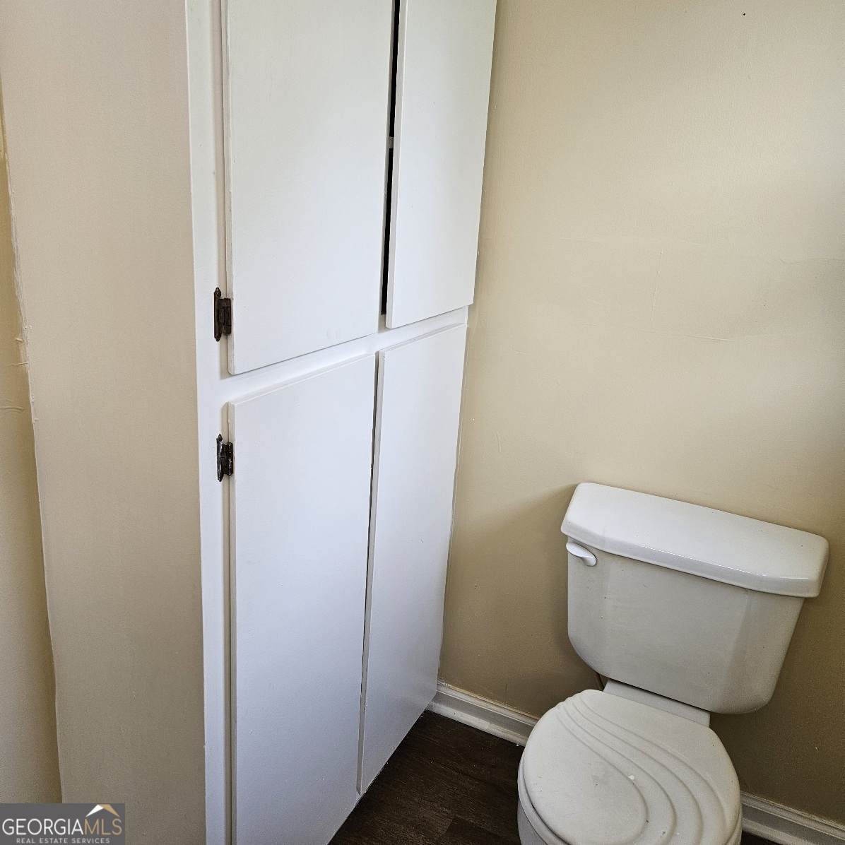 7067 Moseley Road Fort Valley, GA 31030 - Photo 13 of 37 a white toilet sitting next to a shower