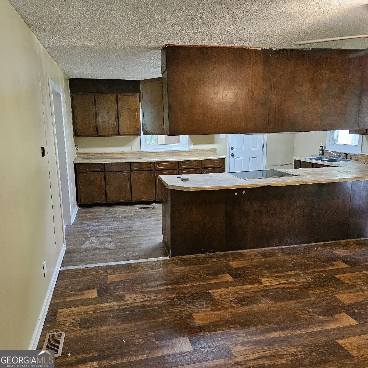 7067 Moseley Road Fort Valley, GA 31030 - Photo 28 of 37 a view of kitchen with wooden floor