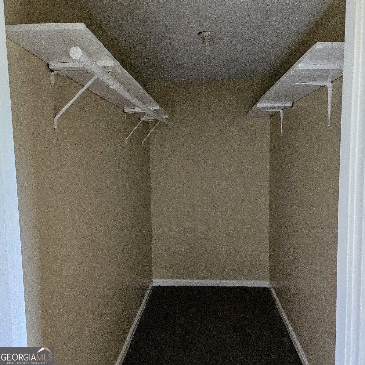 7067 Moseley Road Fort Valley, GA 31030 - Photo 7 of 37 a view of walk in closet