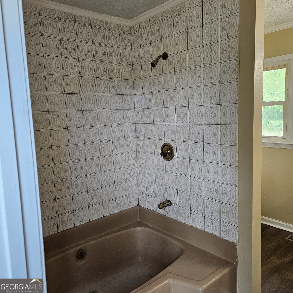 7067 Moseley Road Fort Valley, GA 31030 - Photo 10 of 37 a bathroom with a tub