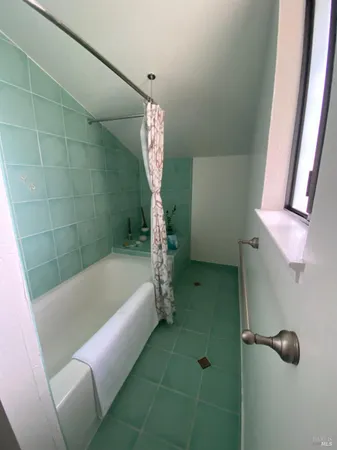 a bathroom with a sink and toilet