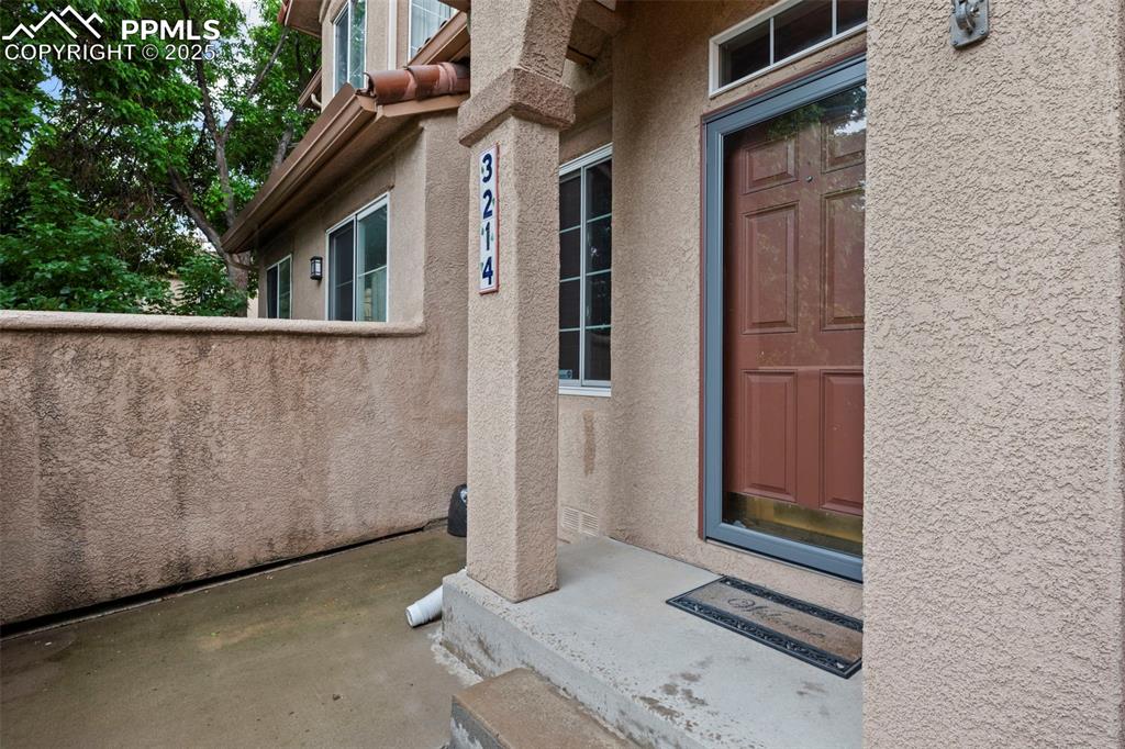 3214 Apogee View Colorado Springs, CO 80906 - Photo 5 of 33 a view of a house with a large window