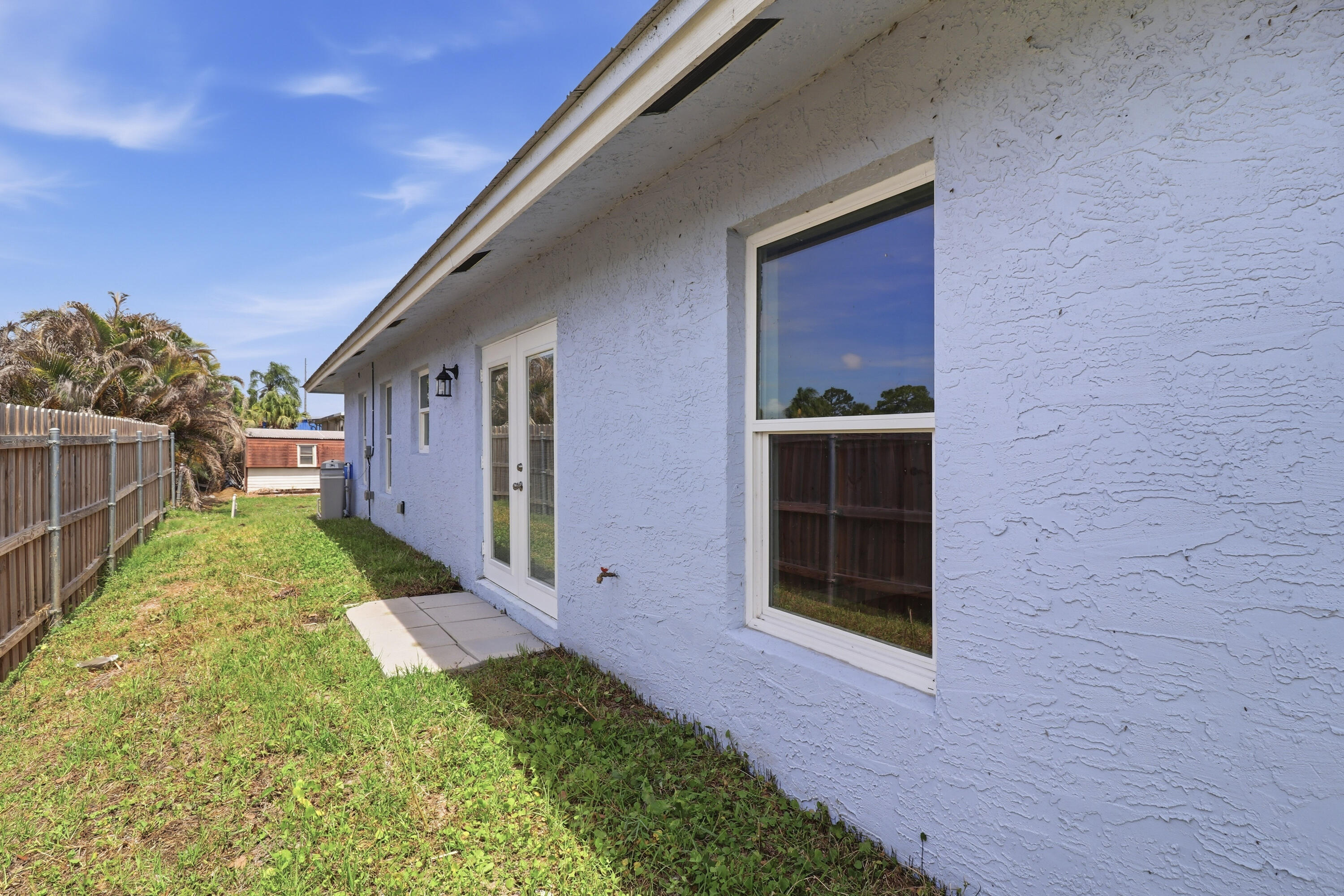 2805 Southeast Carroll Street Stuart, FL 34997 - Photo 19 of 21 a view of backyard of house
