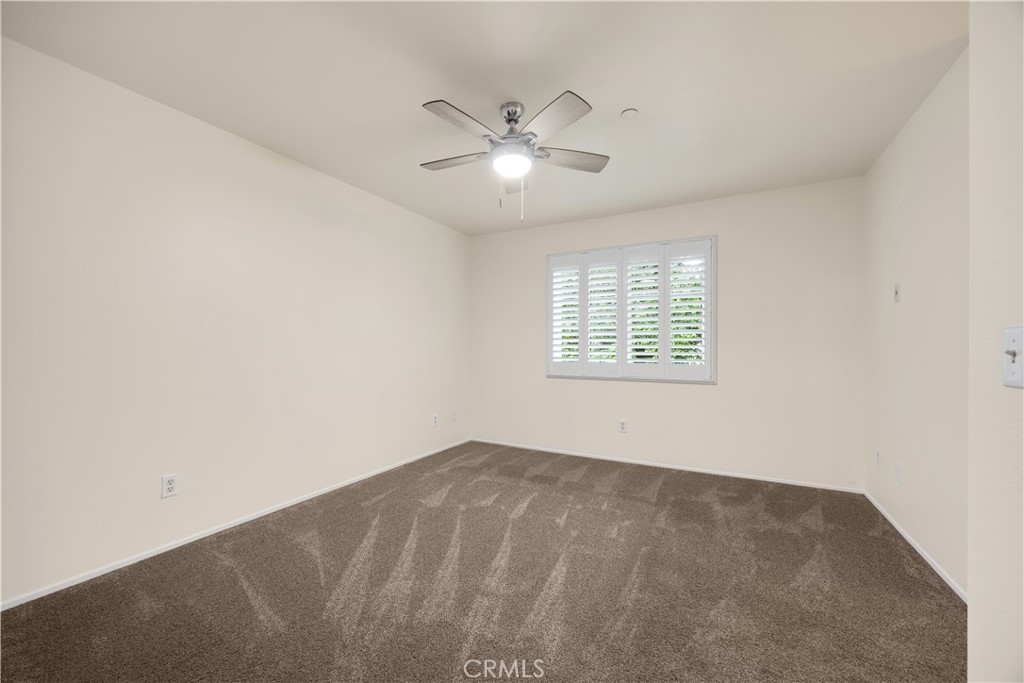 93 Kansas Street, Unit 705 Redlands, CA 92373 - Photo 22 of 33 a view of an empty room with a window