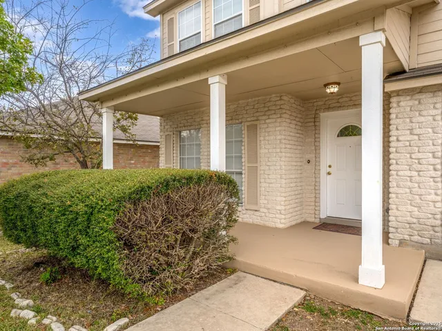 front view of a house with a glass door