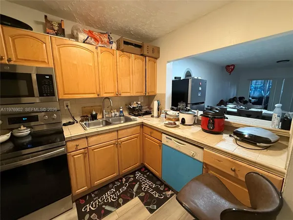 $260,000 | 6070 West 18th Avenue, Unit 209, Hialeah, FL 33012