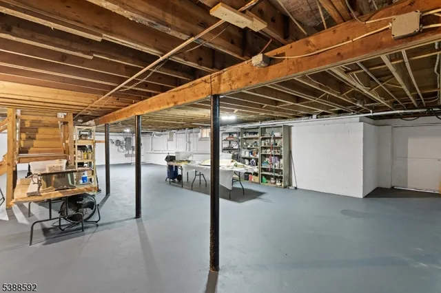 a view of a room with wooden ceiling