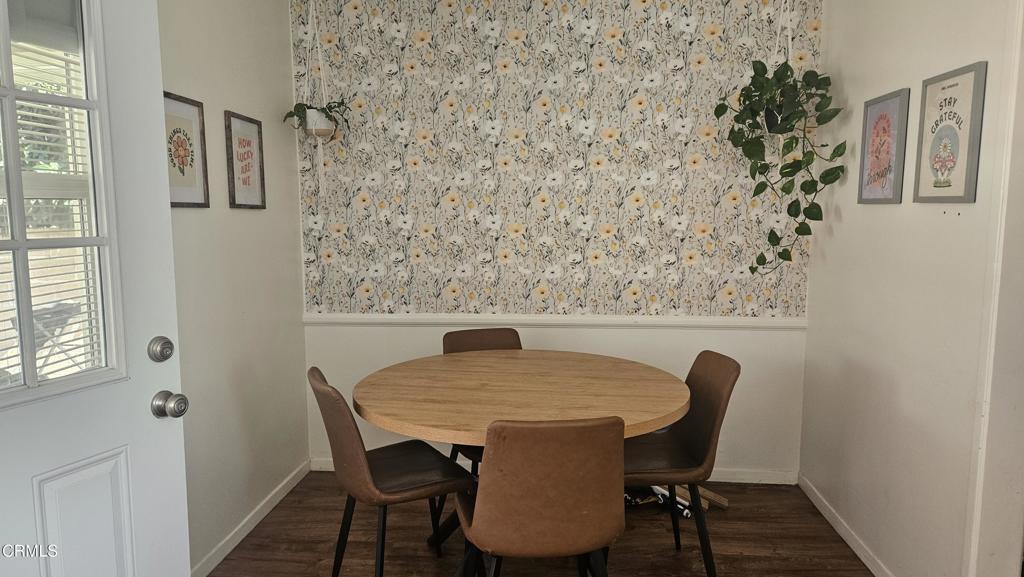 6005 Sutter Street Ventura, CA 93003 - Photo 4 of 11 a view of a dining room with furniture and wooden floor