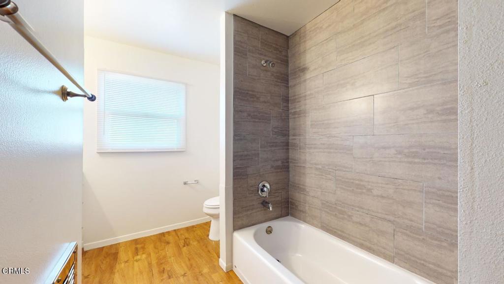 6005 Sutter Street Ventura, CA 93003 - Photo 6 of 11 a bathroom with a bathtub