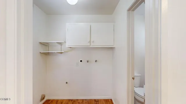 a bathroom with a sink and cabinets