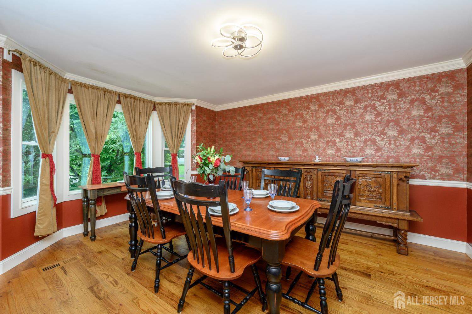 16 Pinewood Lane Washington, NJ 07882 - Photo 15 of 45 a view of a dining room with furniture window and outside view
