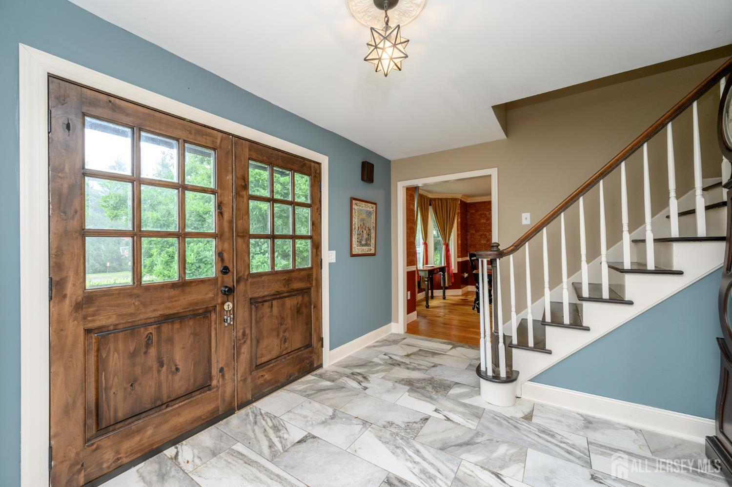 16 Pinewood Lane Washington, NJ 07882 - Photo 3 of 45 a view of an entryway with wooden floor
