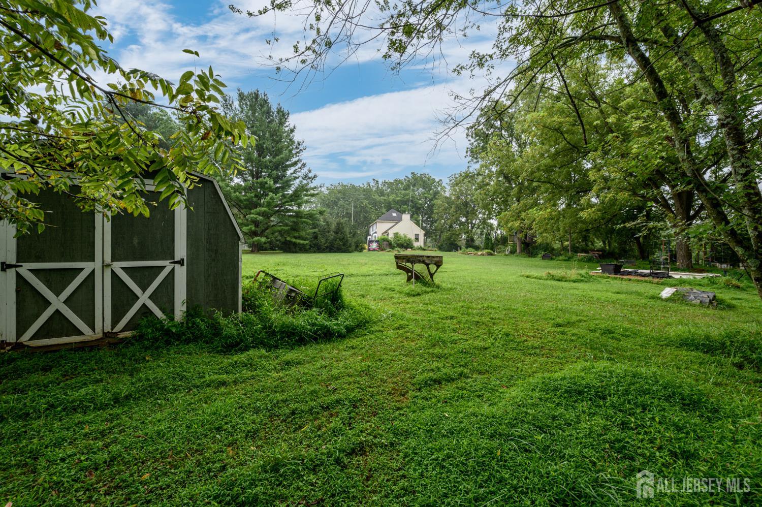 16 Pinewood Lane Washington, NJ 07882 - Photo 40 of 45 a view of a backyard