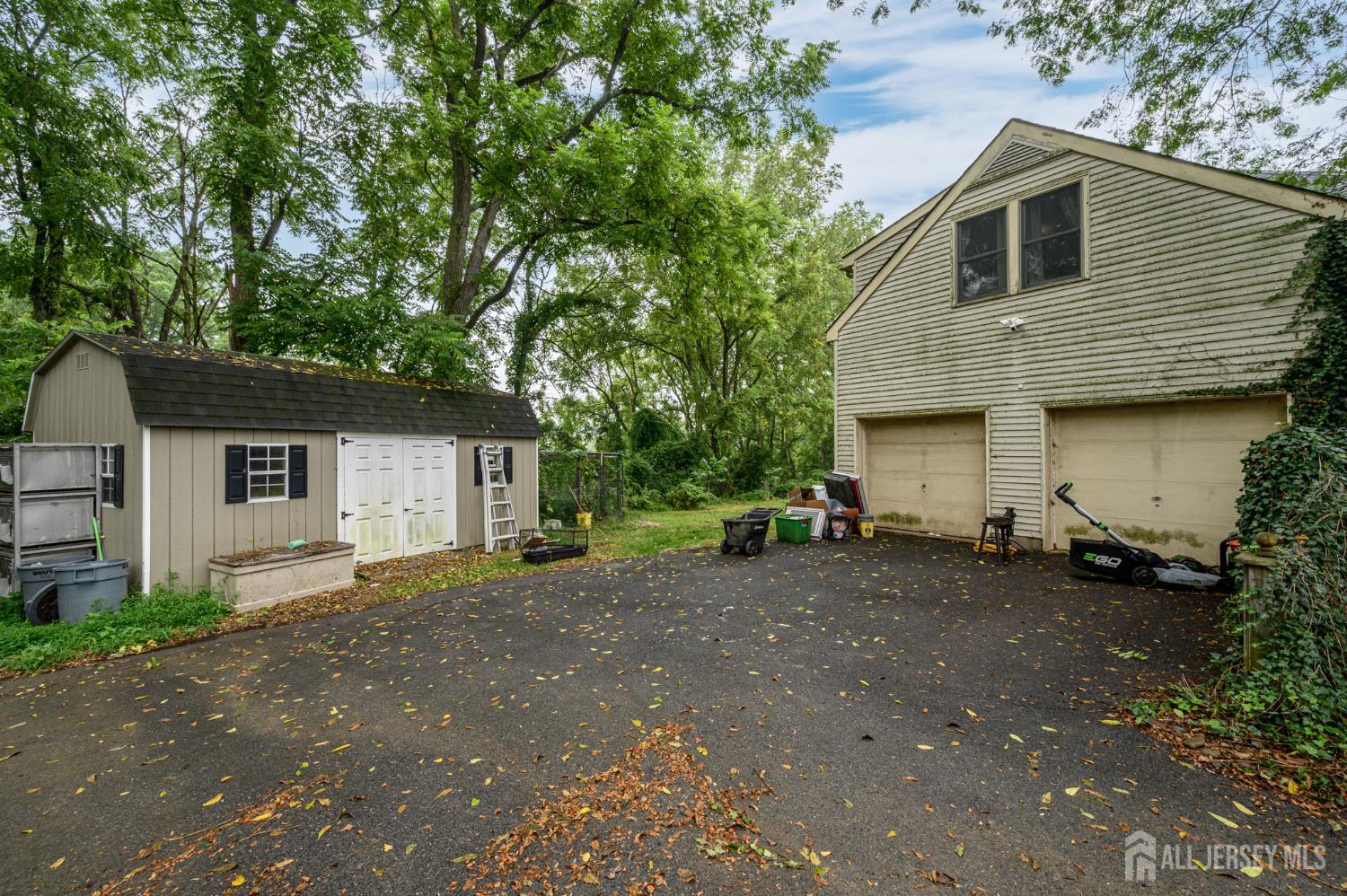 16 Pinewood Lane Washington, NJ 07882 - Photo 41 of 45 a front view of a house with a yard