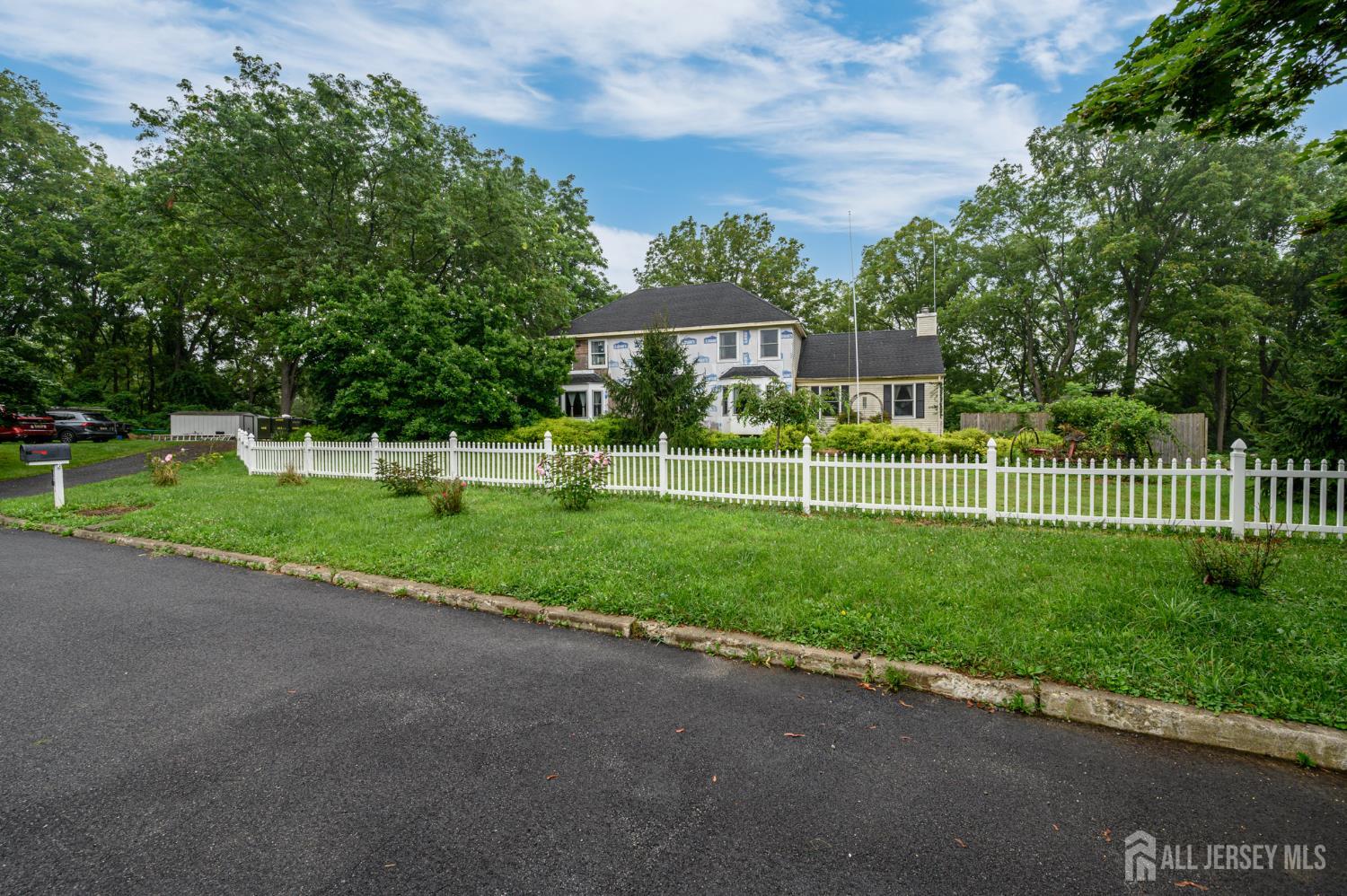 16 Pinewood Lane Washington, NJ 07882 - Photo 44 of 45 a view of a park with a large trees