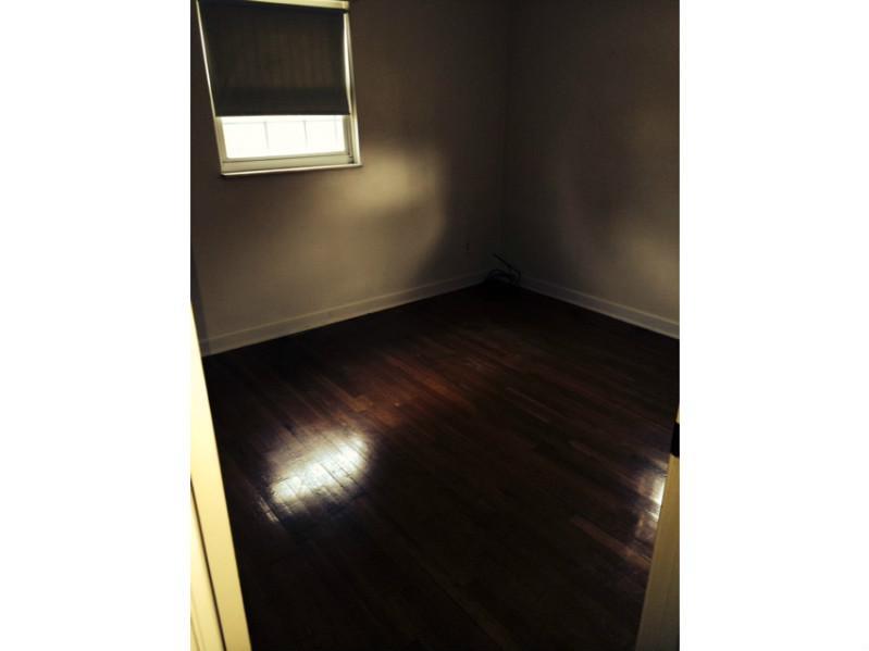 1522 Greentree Road Pittsburgh, PA 15220 - Photo 6 of 10 Exterior Front. Bedroom with Hardwood Floors