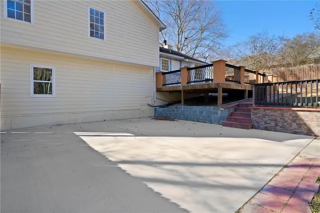 a view of backyard with small cabin