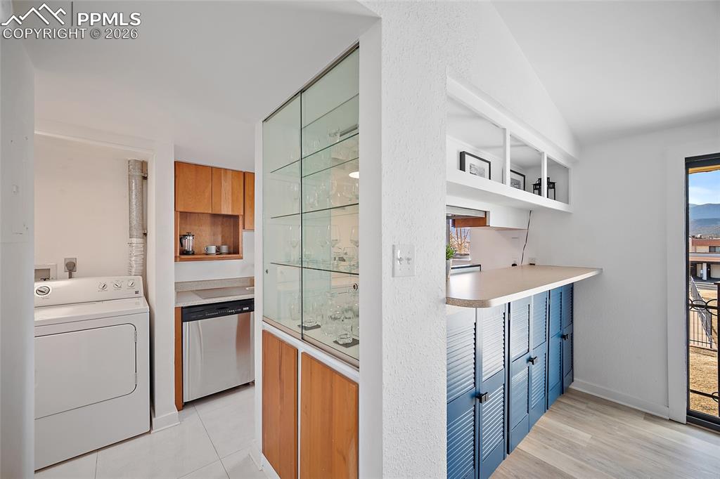 1010 Fontmore Road, Unit D Colorado Springs, CO 80904 - Photo 19 of 43 a kitchen with a sink and a stove top oven