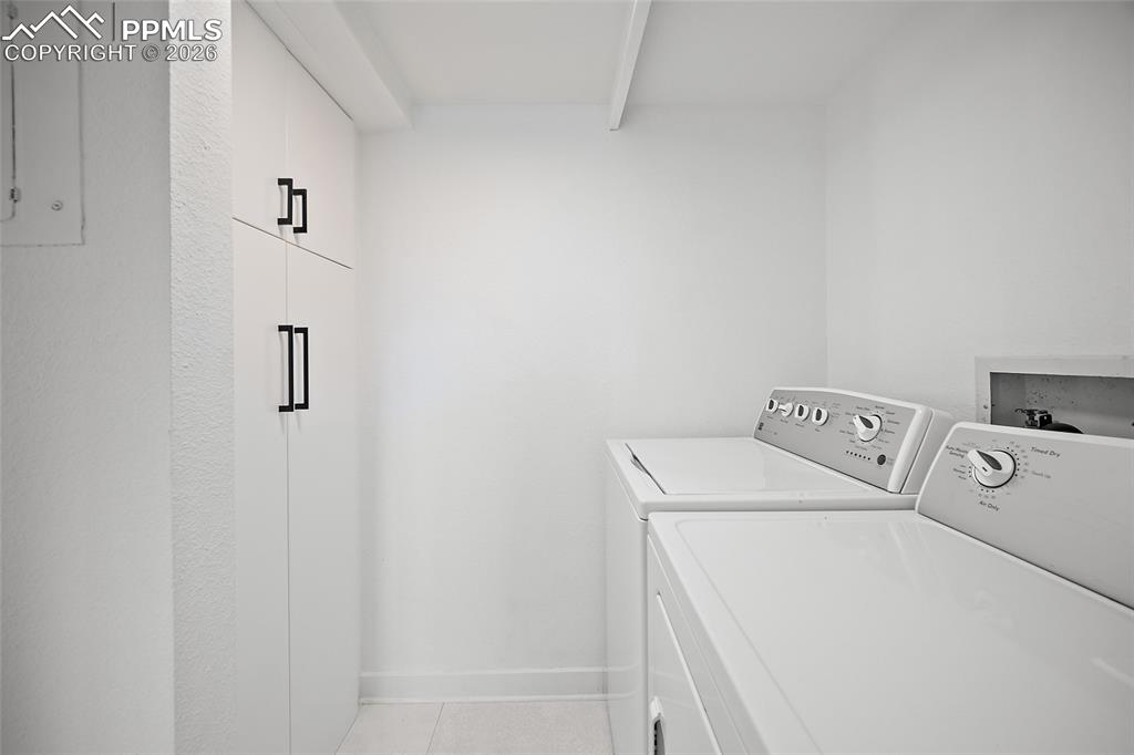 1010 Fontmore Road, Unit D Colorado Springs, CO 80904 - Photo 22 of 43 a utility room with dryer and washer