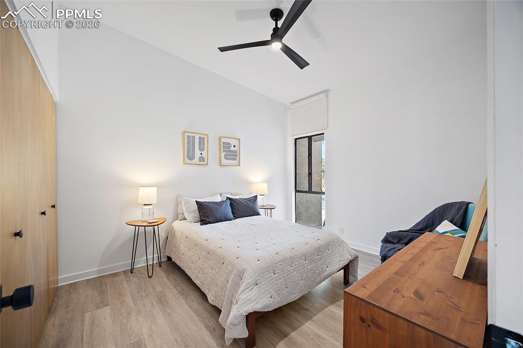 1010 Fontmore Road, Unit D Colorado Springs, CO 80904 - Photo 24 of 43 a bedroom with a bed and a dresser