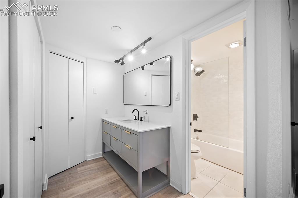 1010 Fontmore Road, Unit D Colorado Springs, CO 80904 - Photo 31 of 43 a bathroom with a sink and a mirror