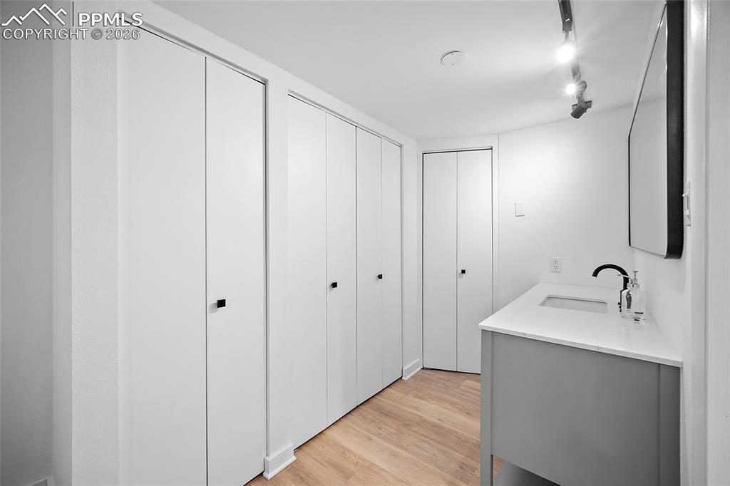 1010 Fontmore Road, Unit D Colorado Springs, CO 80904 - Photo 33 of 43 a bathroom with a sink and a mirror