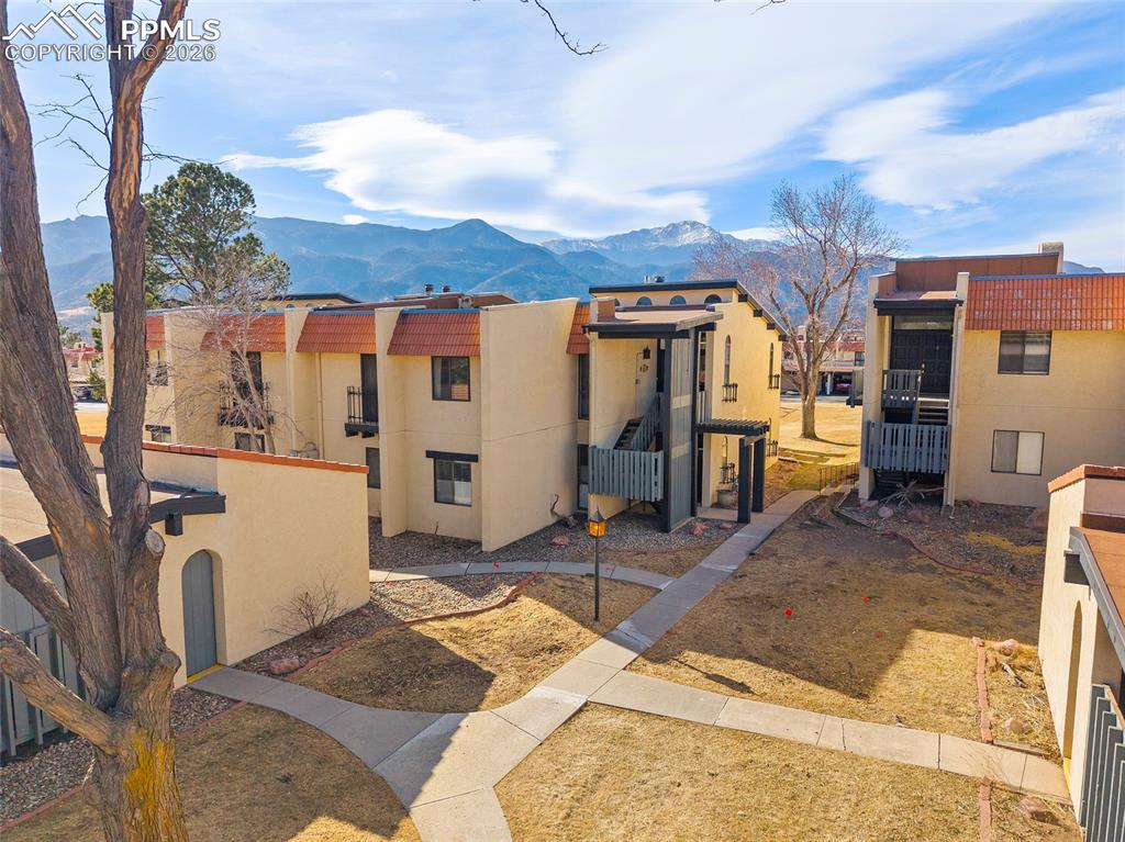1010 Fontmore Road, Unit D Colorado Springs, CO 80904 - Photo 34 of 43 a view of a house with backyard