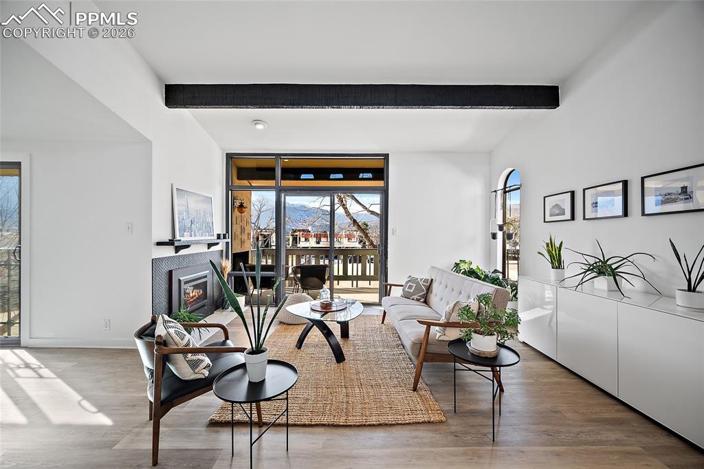 1010 Fontmore Road, Unit D Colorado Springs, CO 80904 - Photo 4 of 43 a dining room with furniture and wooden floor